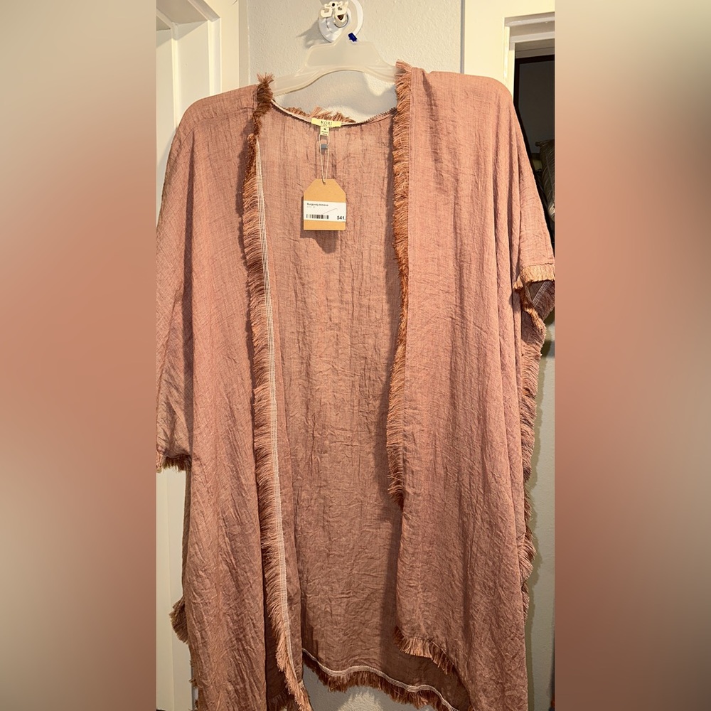 Cover up size M runs bigger